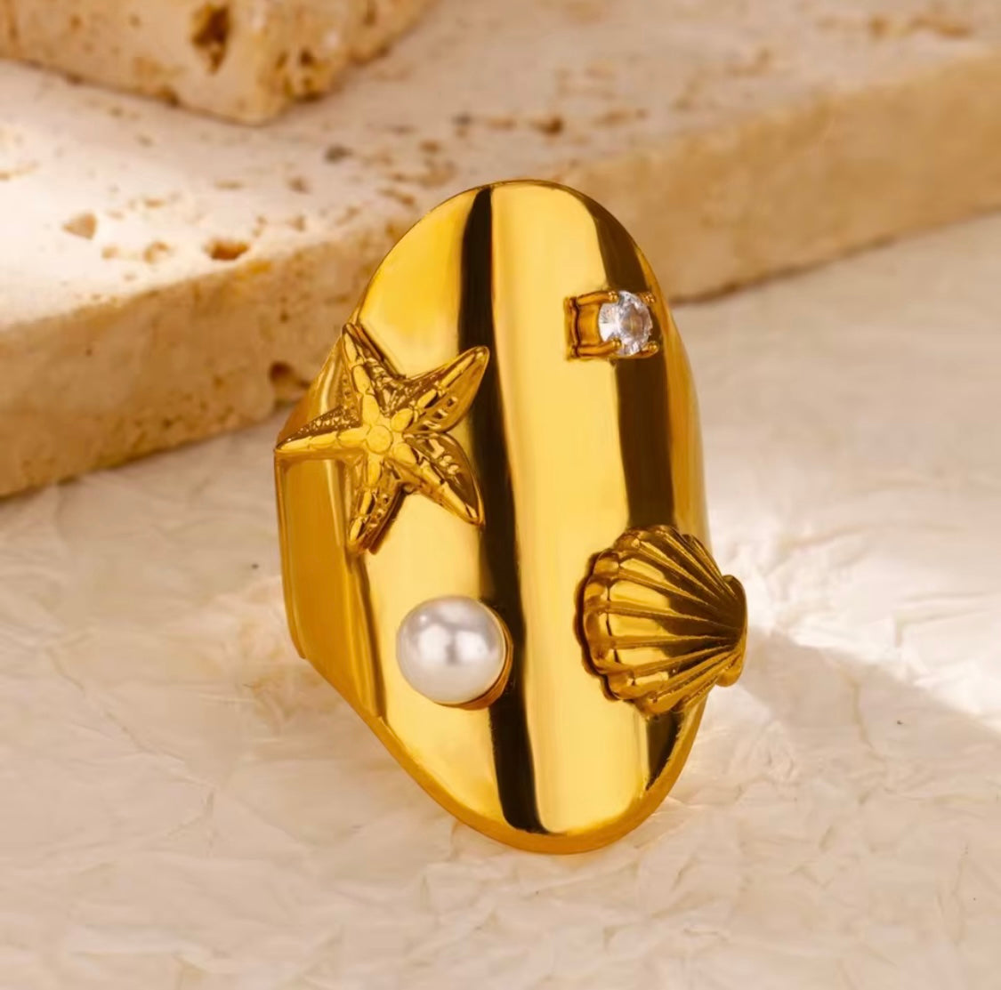 Gold Stainless Steel Shell & Starfish Ring – Ocean-Inspired Adjustable Statement