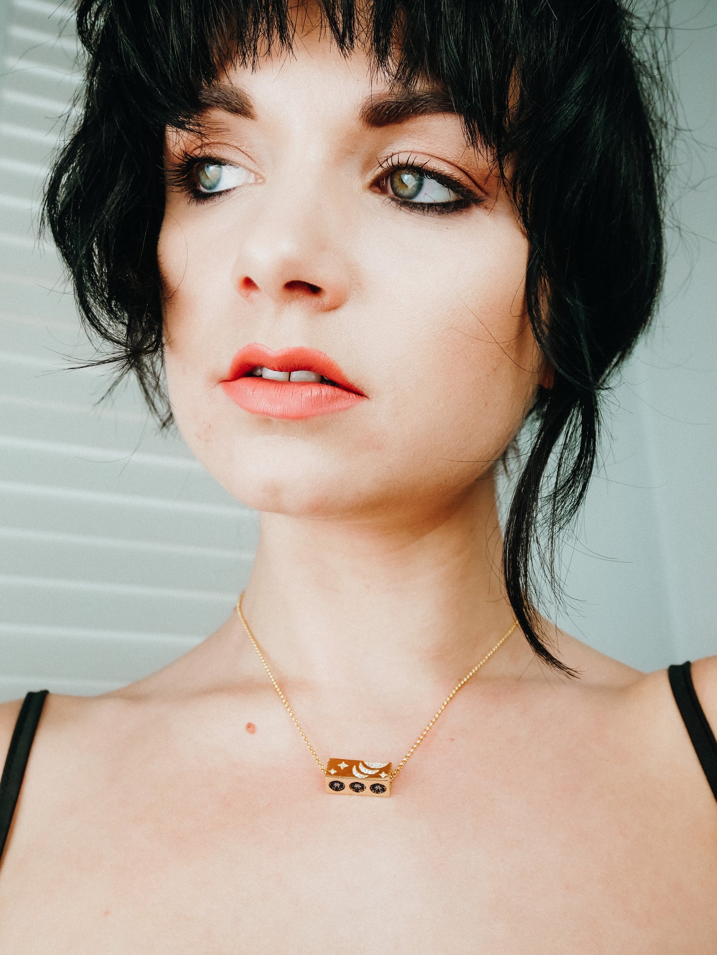 Gold cuboid rotatable element necklace